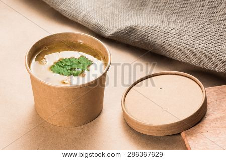 Soup In A Disposable Cup Of Craft Paper