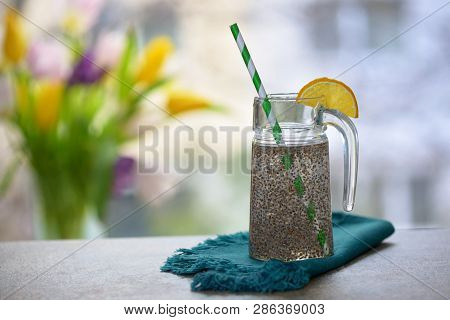 Chia Seeds In Glass Of Water, Close Up