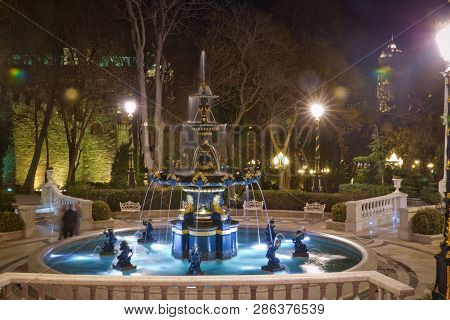 Baku, Azerbaijan - 19.01.2018: Night Philharmonic Fountain Park. Azerbaijan State Philharmonic Hall 