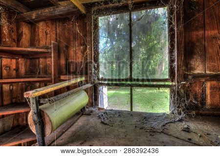 An Old Packaging Station In The Corner Of An Old Dusty Workshop