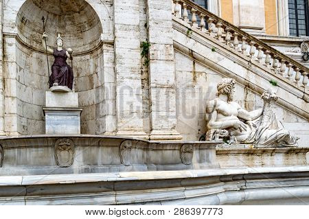 Statue Of The Tiber River God On The Palazzo Senatorio In Piazza Del Campidoglio Square On Capitolin
