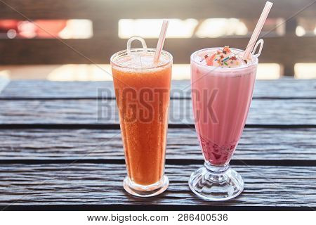 A Glass Of Traditional Indian Drink Faluda And Fresh Papaya Juice. Close-up.