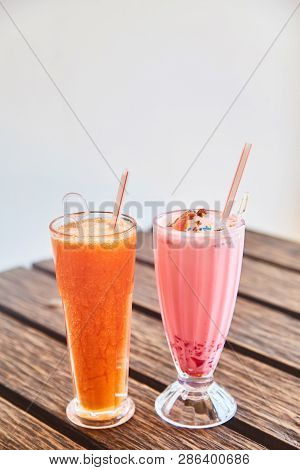 A Glass Of Traditional Indian Drink Faluda And Fresh Papaya Juice. Close-up.