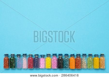 Colored Beads In Special Glass Jars. Female Or Kids Hobby