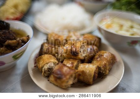 Traditional Vietnamese Fried Springrolls On A Plate. Asian Food Background. Selective Focus, Shallow
