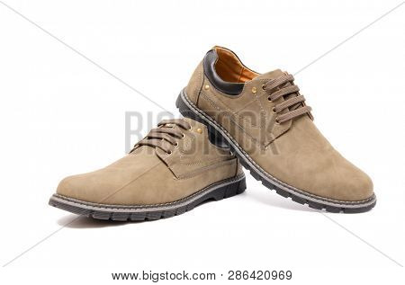 Brown suade shoes isolated on white background
