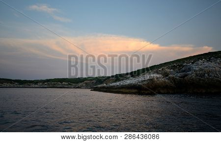 Scenic View Of An Island Of Tremiti Archipelago In The Adriatic Sea, During Sunset
