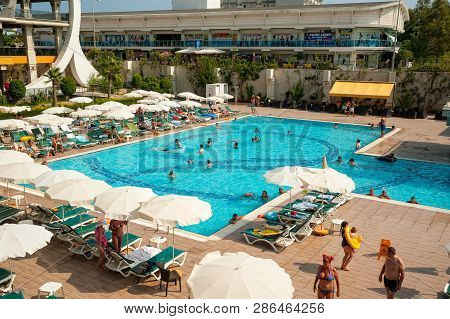 Turkler, Turkey - July 30, 2018: Senza Hotel. Beautiful Luxury Umbrella And Chair Around Outdoor Swi