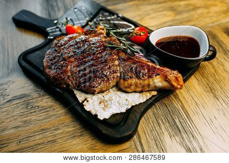 Food Photo. Restaurant Dishes On The Wooden Table.