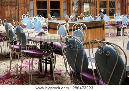 A Group Of Outdoor Restaurant Tables In Byblos, Jbeil, Lebanon.