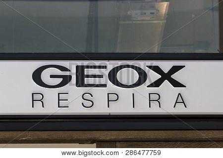 Milan, Italy - 2 June, 2018: Logo Of The Geox Store On The Street Of Milan In Italy.