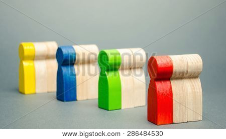 Groups Of Multicolored Wooden People. The Concept Of Market Segmentation. Target Audience, Customer 