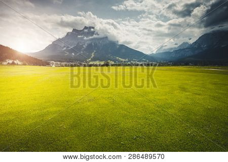 Splendid green golf course in Lermoos village. Location place Austrian Alps, Tyrol, Reutte district, Austria, Europe. Scenic image of most popular vacation destinations. Discover the beauty of earth.
