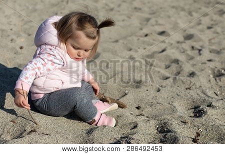 Sitting. Cute. Beach. Sand. Baby. Girl