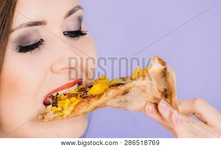 Young Woman Eating Hot Fresh Pizza Slice, On Blue. Delicious Fast Food Meal. People, Italian Cuisine