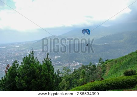 Sky Ricing By Paragliding In Batu Malang, East Java, Indonesia.