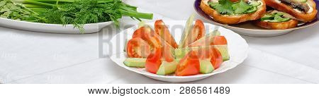 Still Life Of Fresh Green Cucumber And Tomatoes. Panorama Food. Panorama Of Sandwiches And Greens. P
