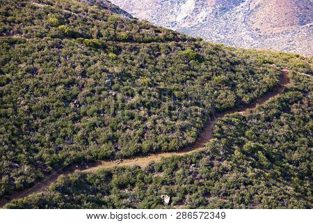 Pacific Crest Hiking Trail Including Switchbacks Up An Arid Mountain Ridge Covered With Chaparral Pl