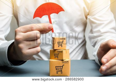 Man Protects Boxes With Goods Insurance Of Purchases And Parcels, Money Back Guarantee And Non-damag