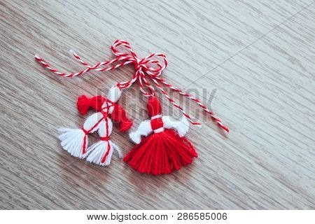 Bulgarian Traditional Spring Decor Martenitsa, Wooden Background. Baba Marta Holiday, Backdrop.