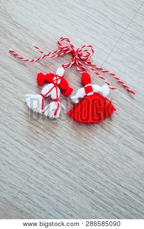 Bulgarian Traditional Spring Decor Martenitsa, Wooden Background. Baba Marta Holiday, Backdrop.