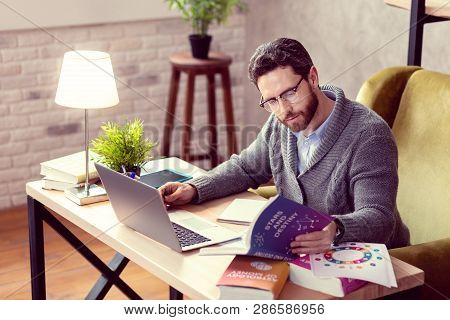 Pleasant Bearded Man Working As An Astrologist