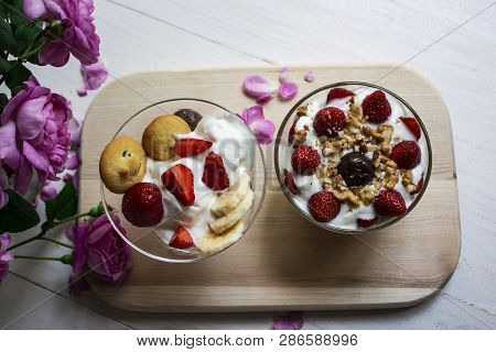 A Berry Dessert With Coffee And Cream And Hot Chocolate Stands On A White Table Outside. Lunch With 