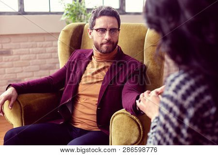 Pleasant Nice Man Enjoying His Fortunetelling Session