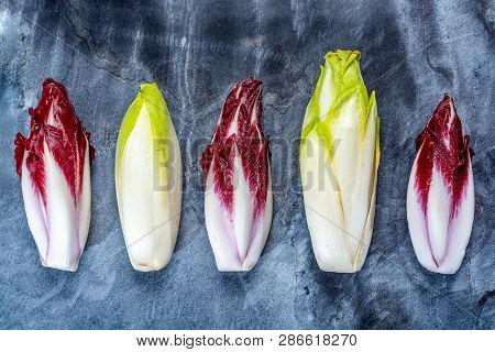 Food Background, Flat Lay Concept With Fresh Green Belgian Endive Or Chicory And Red Radicchio Veget