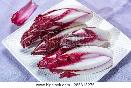 Group Of Fresh Red Radicchio Chicory Or Belgian Endive Vegetables, Also Known As Witlof Salade