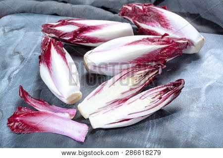 Group Of Fresh Red Radicchio Chicory Or Belgian Endive Vegetables, Also Known As Witlof Salade