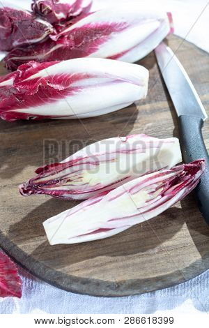 Group Of Fresh Red Radicchio Chicory Or Belgian Endive Vegetables, Also Known As Witlof Salade