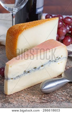 Marble Plate With Sheep Milk Cheese Pur Brebis And Morbier Cow Milk Cheese, France Cheeses Served As