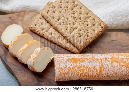 Fagotin Cheese With  Orange Coloured Rind Made From Cow Milk In Caves Of Maredsous Abbey, Belgium