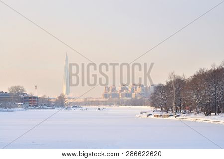 Frozen Neva River On The Outskirts Of St. Petersburg At Sunny Winter Day, Russia.