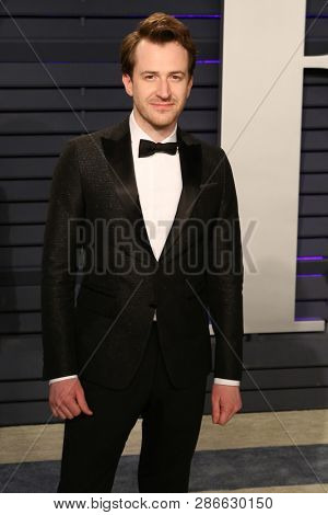 LOS ANGELES - FEB 24:  Joseph Mazzello at the 2019 Vanity Fair Oscar Party on the Wallis Annenberg Center for the Performing Arts on February 24, 2019 in Beverly Hills, 
