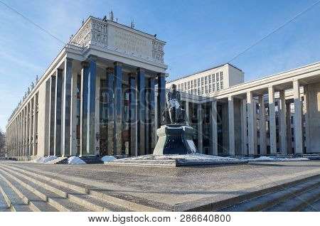 Moscow, Russia - January 25, 2018: Russian State Library And Monument To F. M. Dostoevsky