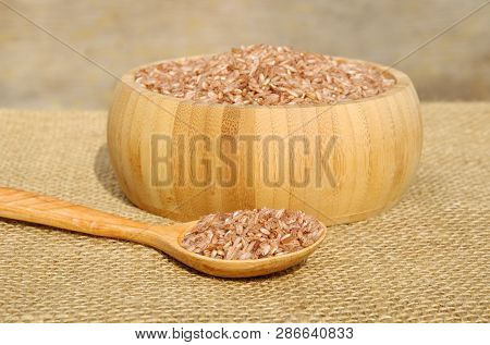 Uzbek Red Rice For Pilaf - Devzira Close-up On Burlap