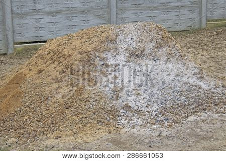 Pile Of Manure On Farm Field In The Winter