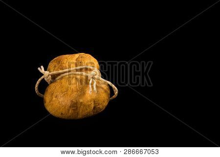 A Variety Of Smoked Cheese On A Black Background.