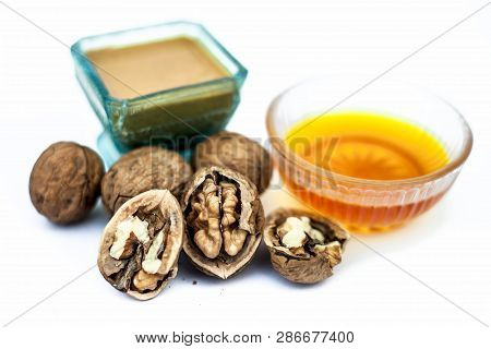 Close Up Of Best Home Remedy To Treat Anemia In A Glass Bowl Isolated On White Consisting Of Walnut