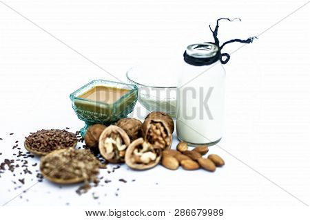 Close Up Of Face Mask Or Face Pack Of Walnut Along With Flax Seed Or Alsi, Almonds,yogurt And Milk I