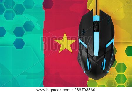 Cameroon Flag  And Computer Mouse. Concept Of Country Representing E-sports Team