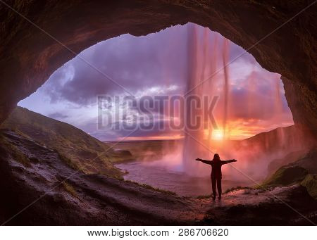 Iceland Landscape Photo Of Adventurous Girl With His Arms Raised Who Proudly Standing Behind The Hug