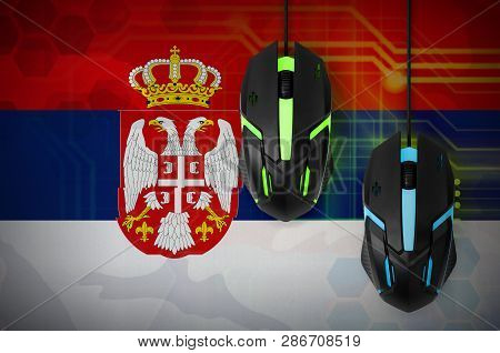 Serbia Flag  And Two Mice With Backlight. Online Cooperative Games. Cyber Sport Team