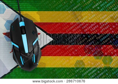 Zimbabwe Flag  And Computer Mouse. Digital Threat, Illegal Actions On The Internet