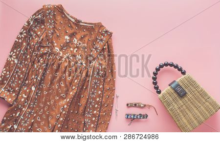 Girls Fashion Background, Brown Dress, Trendy Straw Bag And Bracelets On Pastel Pink, Flat Lay, Top 