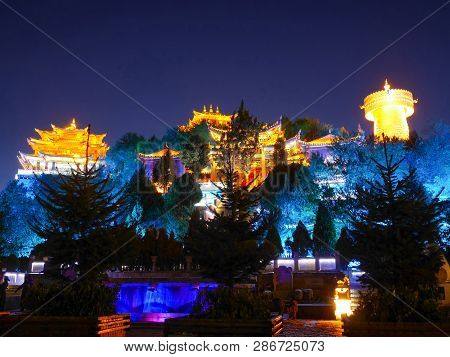 Golden Temple Or Dafo With Colorful Lighting At Night In Shangri-la, Yunnan, China