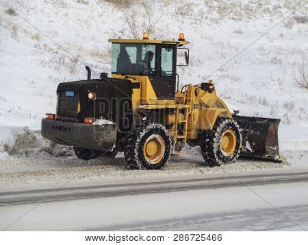 Kazakhstan, Ust-kamenogorsk, January 17, 2019: Snow Removing With Big Wheel Loader. Chinese Wheel Lo