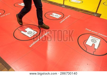 February 18, 2019. City Of Copenhagen, Denmark. Kastrup Airport. Warning Signs On The Floor Of The S